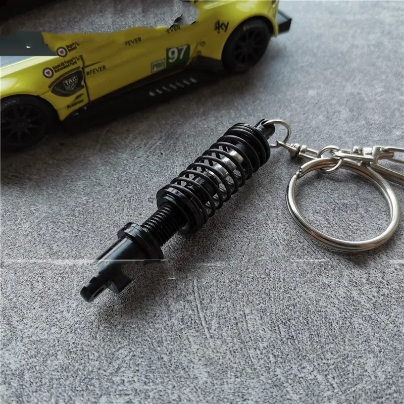 Miniature Spring Shock Absorber Keychain for Car Enthusiasts